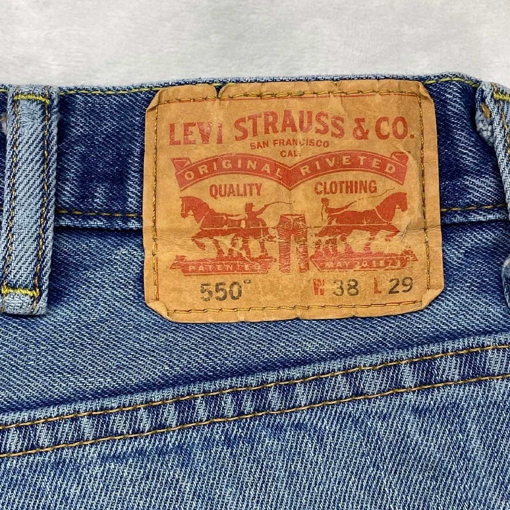 Levi's 550 Relaxed Fit‎ Jeans Faded Light Wash Denim Pants Mens W38 L29 - flaw
